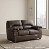 image:imageSignature Design by Ashley Faux Leather Manual Rocker Recliner CaramelUmber