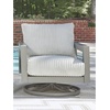 image:imageSignature Design by Ashley Moonlight View Contemporary Nuvella Weather Resistant Fabric Outdoor Chaise Lounge with Zippered Removable Cushions and Throw Pillows Light Gray amp BeigeOutdoor Swivel Chair with Cushion