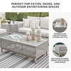 image:imageSignature Design by Ashley Seton Creek Casual Nuvella Weather Resistant Fabric Resin Wicker Swivel Outdoor Bar Height Bar Stool with Cushion Footrest and Armrest Set of 2 Beige amp Light GrayOutdoor Coffee Table