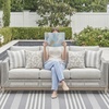 image:imageSignature Design by Ashley Seton Creek Casual Nuvella Weather Resistant Fabric Resin Wicker Swivel Outdoor Bar Height Bar Stool with Cushion Footrest and Armrest Set of 2 Beige amp Light GrayOutdoor Sofa with Cushion