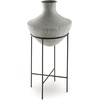 image:imageSignature Design by Ashley Estonbank Vase Distressed Cream Metal Floor Vase with Espresso Brown Stand for Faux Florals amp Seasonal Indoor Outdoor Decor 1413 W x 1413 D x 285 H1525 W x 1525 D x 35 H