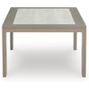 image:imageSignature Design by Ashley Kimpton Isle Contemporary Outdoor Fade and Rust Resistant Coffee Table with Stone Tabletop Light BrownKimpton Isle Rectangular Cocktail Table