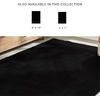 image:imageSignature Design by Ashley Area Rug 8x10 Washable Black Shag Pile