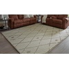 image:imageSignature Design by Ashley Guyford Casual Handmade Wool Indoor 8 x 10 Rug with Geometric Pattern Beige amp Light Brown