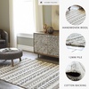 image:imageSignature Design by Ashley Karalee Tribal 5 x 7 Medium Pile Rug with Geometric Design Ivory amp Brown53 x 611 Rectangular
