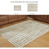 image:imageSignature Design by Ashley Medium Pile Area Rug 5x7 Beige Abstract