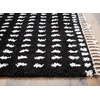 image:imageSignature Design by Ashley Minston Contemporary 5 x 7 Machine Woven Dot Design with Braided Tassel Edge Medium Area Rug High Pile Black amp White5 x 7
