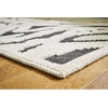 image:imageSignature Design by Ashley Thomwith Contemporary Indoor Washable Zebra Design 8 x 10 Rug with Non Slip Backing Black amp White710 x 101 Rectangular