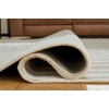 image:imageSignature Design by Ashley Wavy Abstract 8x10 Wool Rug BeigeWhite