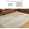 image:imageSignature Design by Ashley Wavy Abstract 8x10 Wool Rug BeigeWhite