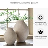 image:imageSignature Design by Ashley 12 Inch Rustic Ceramic Vase Distressed WhiteTan