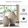 image:imageSignature Design by Ashley 12 Inch Rustic Ceramic Vase Distressed WhiteTan