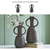 image:imageSignature Design by Ashley Aadeen Transitional Indoor 14 Distressed Terra Cotta Tabletop Vase with Handle Dark Brown