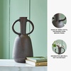 image:imageSignature Design by Ashley Aadeen Transitional Indoor 17 Distressed Terra Cotta Tabletop Vase with Handle Dark Brown