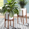 image:imageSignature Design by Ashley Dorcey Mid Century Planter with Stand Set of 2MidCentury Modern