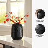 image:imageSignature Design by Ashley Ryanford Modern Indoor 10 HandCarved Glass Tabletop Vase Black725 W x 725 D x 10 H
