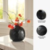 image:imageSignature Design by Ashley Ryanford Modern Indoor 10 HandCarved Glass Tabletop Vase Black75 W x 75 D x 7 H