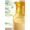 image:imageSignature Design by Ashley Wynburg Vase Enamel Glass Vase with HandPainted Ombre Finish for Faux and Dried Floral Arrangements 825 W x 825 D x 1888 H825 W x 825 D x 19 H