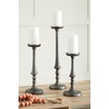 image:imageSignature Design by Ashley Eravell Casual Candle Holder Set for Pillar Candles Set of 3 Gray