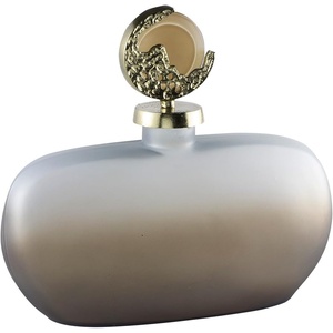 image:imageSignature Design by Ashley Acario Traditional Frosted Glass Jar with Cast Aluminum Textured Topper Light Brown and Metallic 1125 W x 538 D x 1763 H3046 Ounces