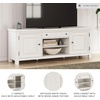 image:imageSignature Design by Ashley Robbinsdale Casual 72 TV Stand for TVs up to 82 with Cabinet Doors and Adjustable Shelves WhiteWhite