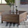 image:imageSignature Design by Ashley Wood LiftTop Coffee Table with Storage BrownLight Brown